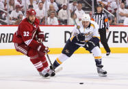 GLENDALE, AZ - APRIL 27: Brandon Yip #18 of the Nashville Predators skates with the puck past Michal Rozsival #32 of the Phoenix Coyotes in Game One of the Western Conference Semifinals during the 2012 NHL Stanley Cup Playoffs at Jobing.com Arena on April 27, 2012 in Glendale, Arizona. (Photo by Christian Petersen/Getty Images)