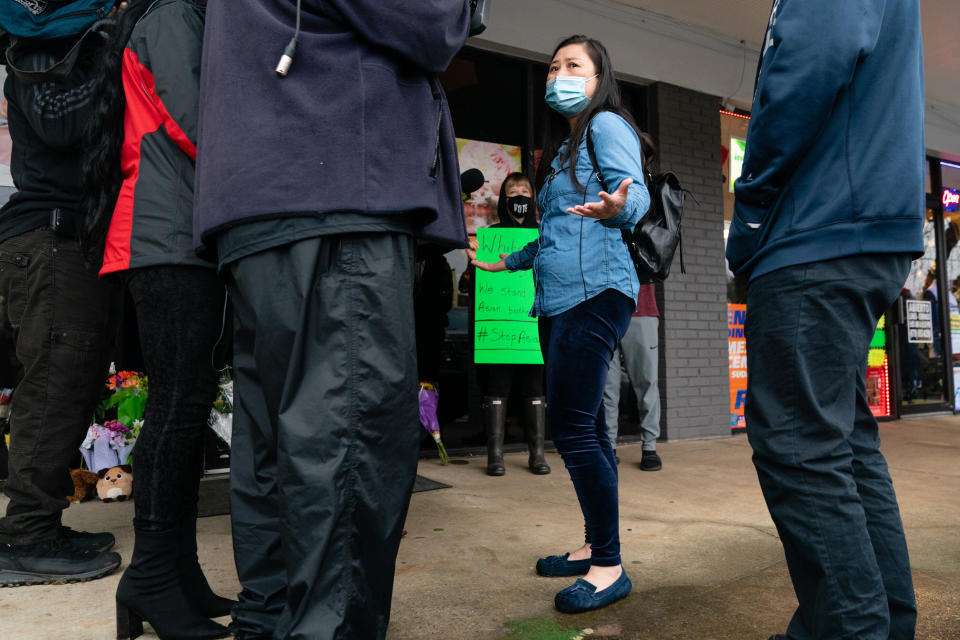 Lijing Zhao, owner of Jo Jos Massage, speaks to the media on March 17, 2021, after laying a bouquet of flowers outside the spa where four people were shot and killed in Acworth, Georgia.  (Photo: Elijah Nouvelage via Getty Images)