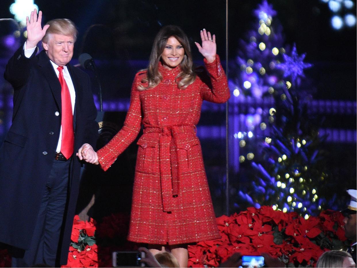 President Donald Trump and the first lady Melania Trump attend the 95th annual National Christmas Tree Lighting held by the National Park Service at the White House Ellipse: Astrid Riecken/Getty Images