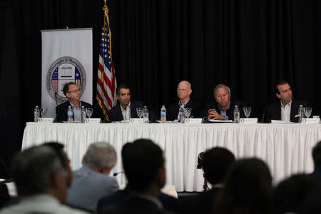 Chairman of the Federal Fiscal Control Board Jose Carrion (R) and members of the board (L-R) Andrew Biggs, Carlos Garcia, Arthur Gonzalez and Jose Gonzalez attend a meeting of the Financial Oversight and Management Board for Puerto Rico in San Juan, Puerto Rico October 31, 2017. REUTERS/ Alvin Baez