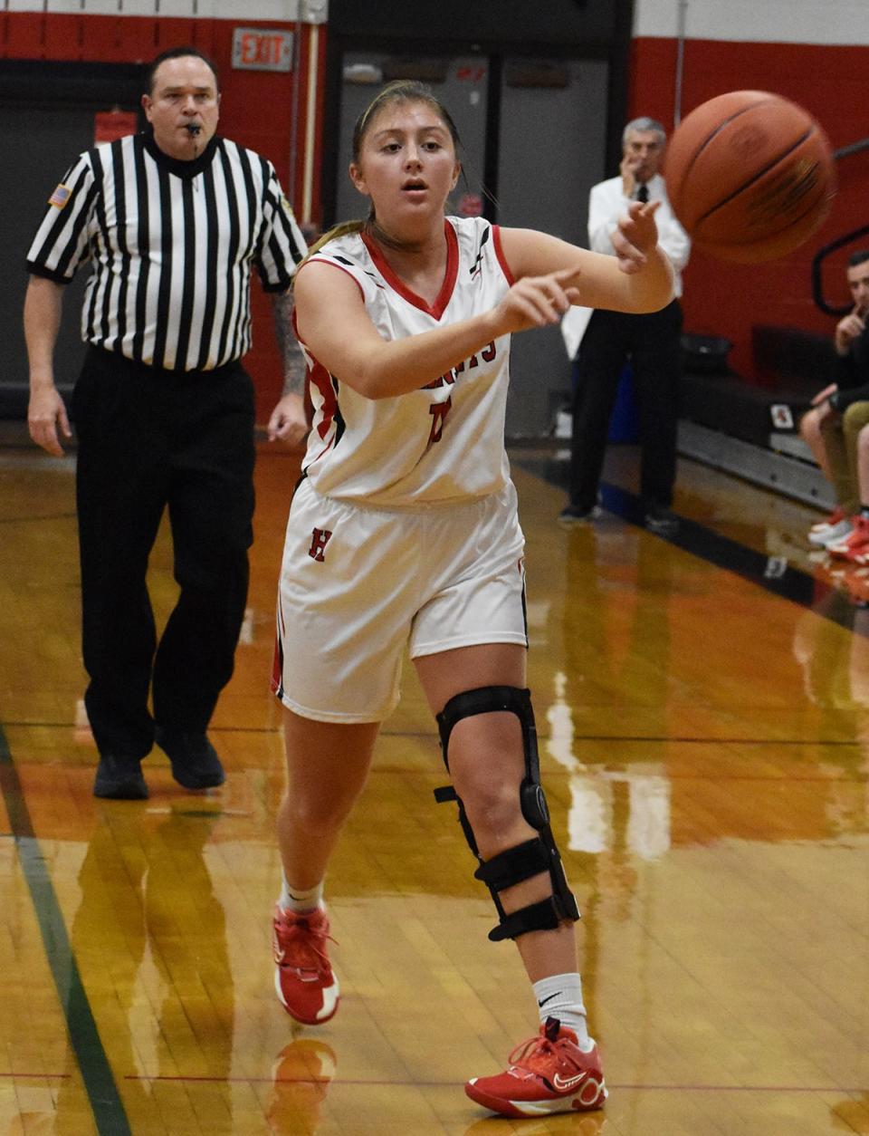 Senior co-captain Elyse Montgomery finds an open teammate for Honesdale in its early season battle with Dunmore.