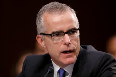 FILE PHOTO:  Acting FBI Director Andrew McCabe testifies before a Senate Intelligence Committee hearing on Capitol Hill in Washington, D.C., U.S., June 7, 2017.  REUTERS/Aaron P. Bernstein/File Photo