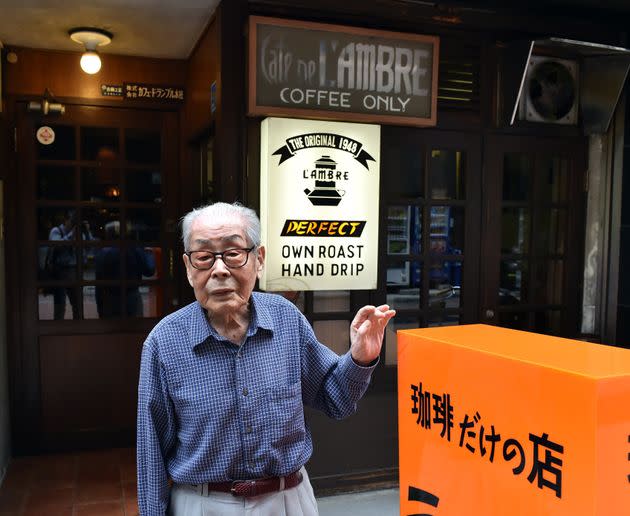 Coffee shop owner Ichiro Sekiguchi stands in front of his shop Cafe de L'Ambre in Tokyo on Oct. 8, 2014.