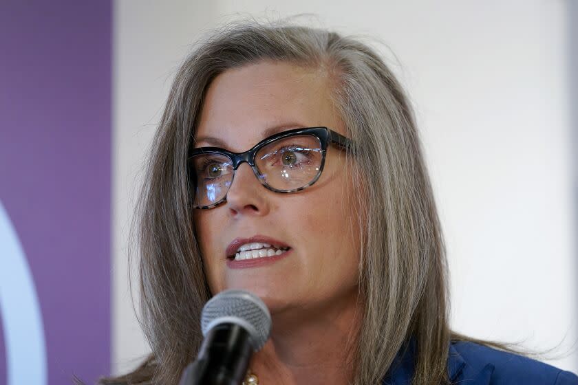 FILE - Democratic Arizona Gov.-elect Katie Hobbs speaks at a victory rally, Tuesday, Nov. 15, 2022, in Phoenix. An Arizona judge on Thursday, Dec. 1, ordered Cochise County officials to certify the midterm election results by the end of the day. Hobbs filed suit Monday, as did a local voter and a group of retirees, arguing the supervisors are required by law certify the election, a process formally known as a canvass. Hobbs says she is required to hold the statewide certification on Dec. 5 and by law can delay it only until Dec. 8. (AP Photo/Matt York)