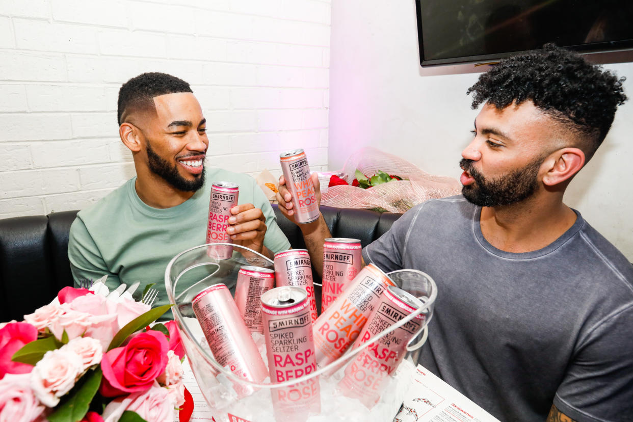 CHICAGO, ILLINOIS - MARCH 10: Mike Johnson and Dustin Kendrick react to the season finale of The Bachelor while sippingon Smirnoff Seltzer Rosés on March 10, 2020 in Chicago, Illinois. (Photo by Jeff Schear/Getty Images for Smirnoff)