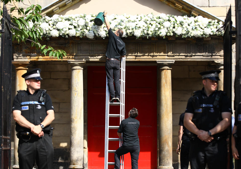 EDINBURGH, SCOTLAND - JULY 30:  Workers do finnishing touches prior to the Royal wedding of Zara Phillips and Mike Tindall at Canongate Kirk on July 30, 2011 in Edinburgh, Scotland. The Queen's granddaughter Zara Phillips will marry England rugby player Mike Tindall today at Canongate Kirk. Many royals are expected to attend including the Duke and Duchess of Cambridge.  (Photo by Jeff J Mitchell/Getty Images)