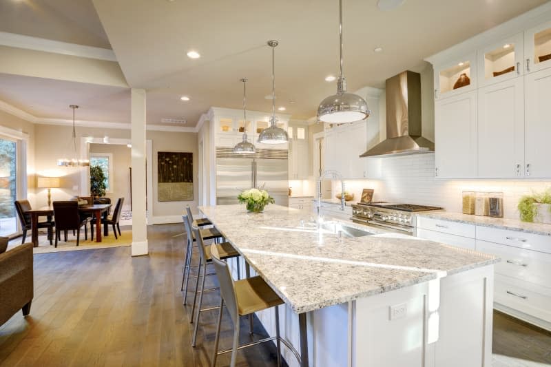 Open-concept white kitchen