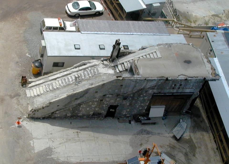 FILE - This undated file photo provided by the National Trust for Historic Preservation shows the World Trade Center Vesey Street staircase in New York. The National Trust for Historic Preservation has released its annual list of America's 11 Most Endangered Historic Places, which once included the staircase, which is now listed as "saved." Before the 2001 terrorist attacks, the stairs consisted of two granite-clad flights of stairs and an escalator that led from the trade center plaza to Vesey Street. When the towers collapsed, the heavily damaged stairs served as an escape route for hundreds of people. In 2008, the staircase was installed at the below-ground memorial museum being constructed at ground zero. (AP Photo/Robert Kornfeld, Jr. and Richard Zimbler, National Trust, File)