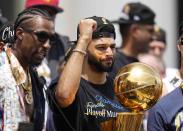 Denver Nuggets guard Jamal Murray celebrates during a rally to mark the Nuggets first NBA basketball championship Thursday, June 15, 2023, in Denver. (AP Photo/Jack Dempsey)