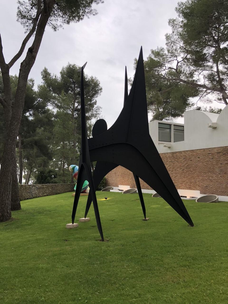 <p>The next day was the show, held at the Fondation Maeght. The setting was incredible. Larger-than-life Calder and Miro statues lined the walkway. As you walked through the courtyard, there was a live symphony and at every corner there was an A-list actress.</p><p>The <a rel="nofollow noopener" href="https://www.elle.com/runway/g20956244/louis-vuitton-resort-runway-show-2019/" target="_blank" data-ylk="slk:show was breathtaking;elm:context_link;itc:0;sec:content-canvas" class="link ">show was breathtaking</a>. The clothes, the soundtrack, and the models were stunning (and diverse)! After the show, we went to Eden-Roc for the after party. There was a huge oyster bar and their pool boys were decked out in red and white LV Cruise attire.</p>