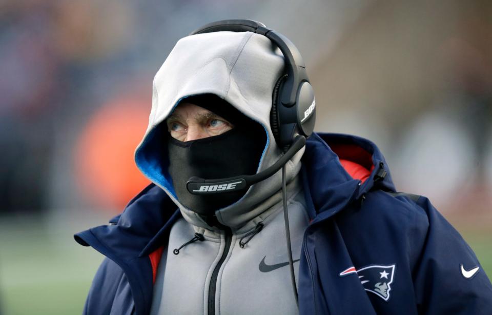 New England Patriots head coach Bill Belichick may be bundling up like this when his team hosts the Cincinnati Bengals on Sunday