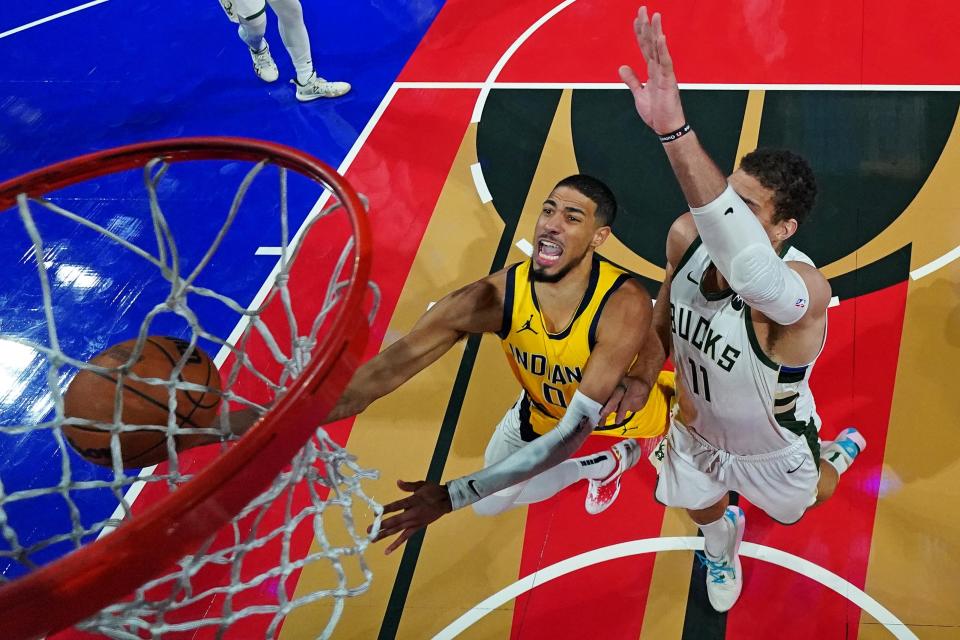 Indiana Pacers guard Tyrese Haliburton (0) shoots the ball against Milwaukee Bucks center Brook Lopez (11) in the NBA In Season Tournament Semifinal at T-Mobile Arena in Las Vegas on Dec. 7, 2023.