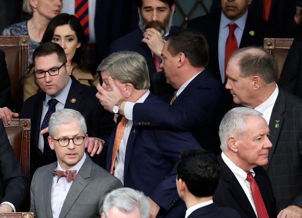 U.S. Rep.-elect Mike Rogers (R-AL) (C) is restrained by Rep.-elect Richard Hudson (R-NC) after getting into an argument with Rep.-elect Matt Gaetz (R-FL) in the House Chamber during the fourth day of elections for Speaker of the House at the U.S. Capitol Building on January 06, 2023 in Washington, DC.