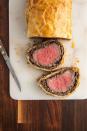 <p>Now <em>this</em> is a holiday winner. Some people like to make their own <a href="https://www.delish.com/cooking/recipe-ideas/g37271980/puff-pastry-appetizers/" rel="nofollow noopener" target="_blank" data-ylk="slk:puff pastry;elm:context_link;itc:0;sec:content-canvas" class="link ">puff pastry</a> for their beef Wellington. But, we've found that, not only is store bought puff pastry much more convenient, it's also incredibly delicious.</p><p>Get the <a href="https://www.delish.com/cooking/recipe-ideas/recipes/a58702/easy-beef-wellington-recipe/" rel="nofollow noopener" target="_blank" data-ylk="slk:Beef Wellington recipe;elm:context_link;itc:0;sec:content-canvas" class="link "><strong>Beef Wellington recipe</strong></a>.</p>