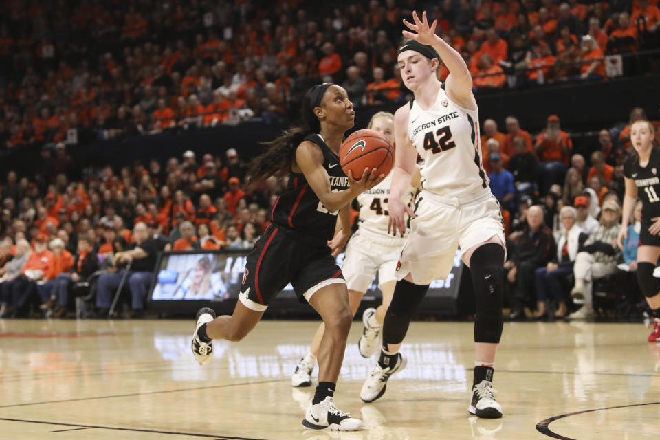 Stanford's Kiana Williams (23) drives to the basket past Oregon State's Kennedy Brown (42) during the first half of an NCAA college basketball game in Corvallis, Ore., Sunday, Jan. 19, 2020. (AP Photo/Amanda Loman)