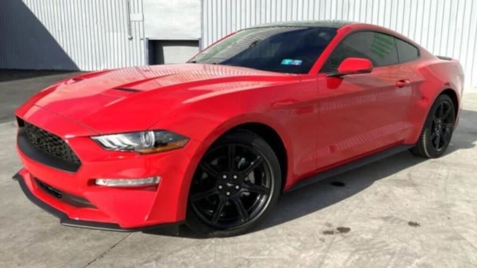 A 2019 Ford Mustang Ecoboost Premium for sale at auction. - US Marshals Service/Apple Towing Company