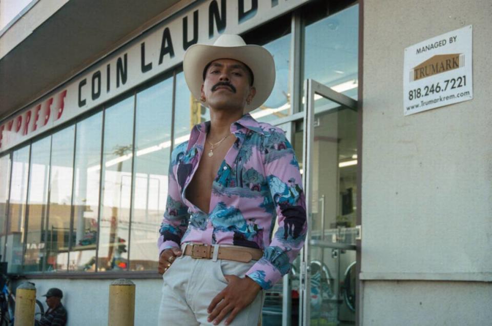 Fabian Guerrero, “Jose in front of Laundromat,” Lynwood, CA, 2017. From the series Brown Queer Rancheros.