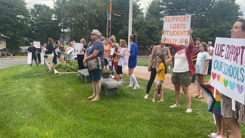 Counter protesters appeared to challenge a group at Winnacunnet High School who gathered to call on school officials to stop an upcoming teacher training related to LGBTQ+ issues.