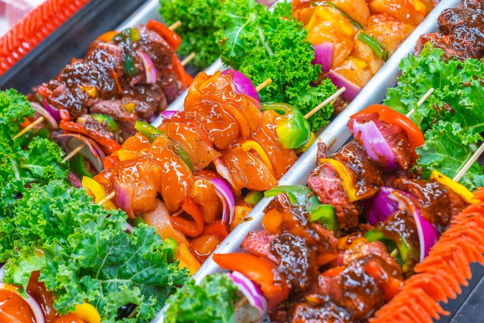 Ready to grill: a variety of skewered meats at Doris Italian Market.