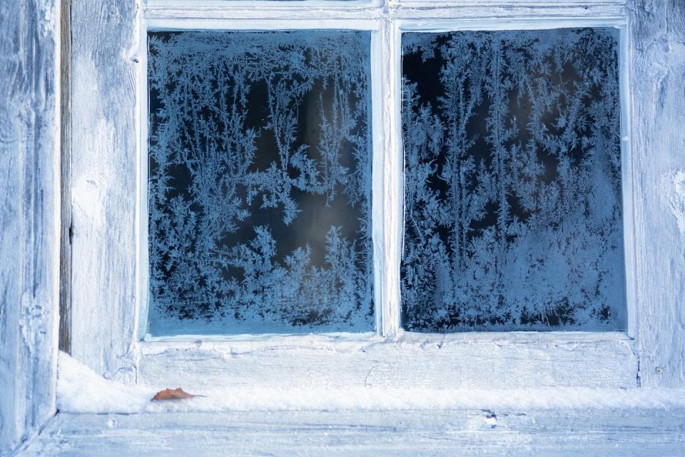 Ice crystals on an old window in Norway. <a href="https://www.gettyimages.com/detail/photo/frost-on-a-old-window-royalty-free-image/1191072525?adppopup=true" rel="nofollow noopener" target="_blank" data-ylk="slk:Baac3nes/Moment via Getty Images;elm:context_link;itc:0;sec:content-canvas" class="link ">Baac3nes/Moment via Getty Images</a>