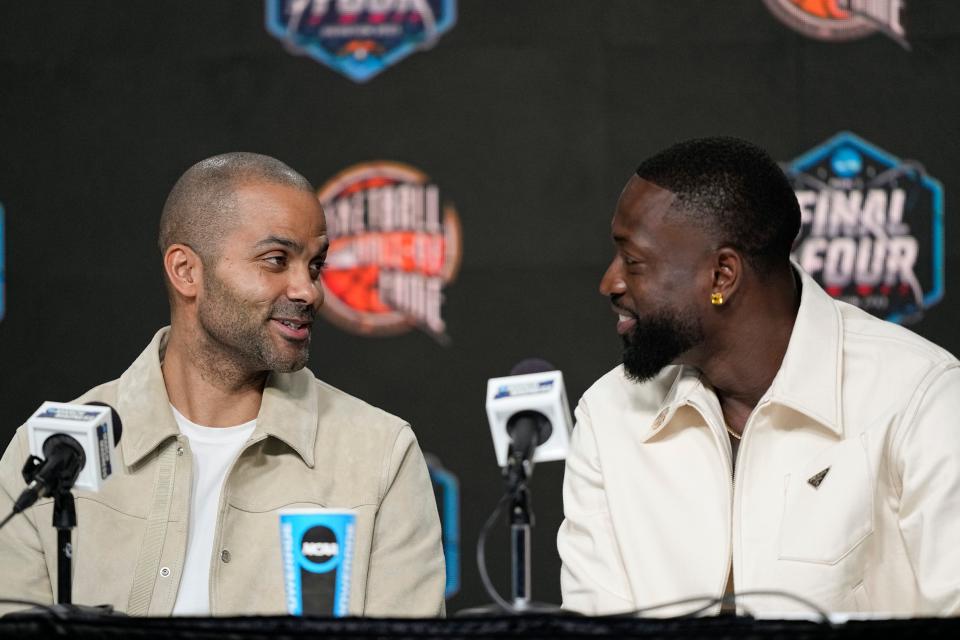 Tony Parker and Dwyane Wade talk during a news conference for the The Naismith Basketball Hall of Fame at the NCAA college basketball Tournament on Saturday, April 1, 2023, in Houston. (AP Photo/David J. Phillip)
