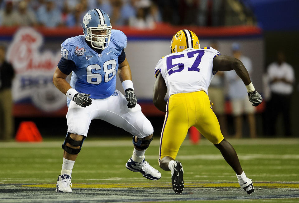 Sep 4, 2010; Atlanta, GA, USA; North Carolina Tar Heels offensive linesman James Hurst (68) works against LSU Tigers linebacker Lamin Barrow (57) at the Georgia Dome. LSU defeated North Carolina 30-24. Mandatory Credit: Paul Abell-USA TODAY Sports