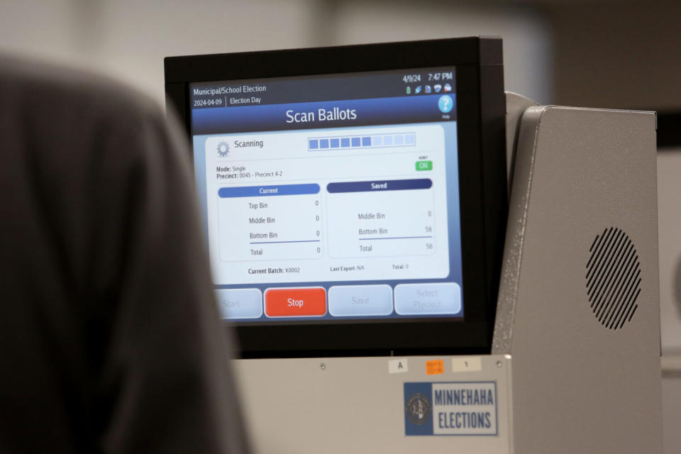 Tabulator scans ballots during the Sioux Falls city and school board election on April 9, 2024. (Makenzie Huber/South Dakota Searchlight)