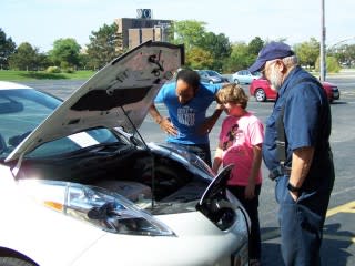 National Drive Electric Week 2014: Peeking under the hood in Perrysburg, OH. Photo by Michael Hall.