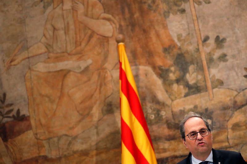 The leader of Catalonia's regional government Quim Torra delivers a statement at Palau de la Generalitat in Barcelona