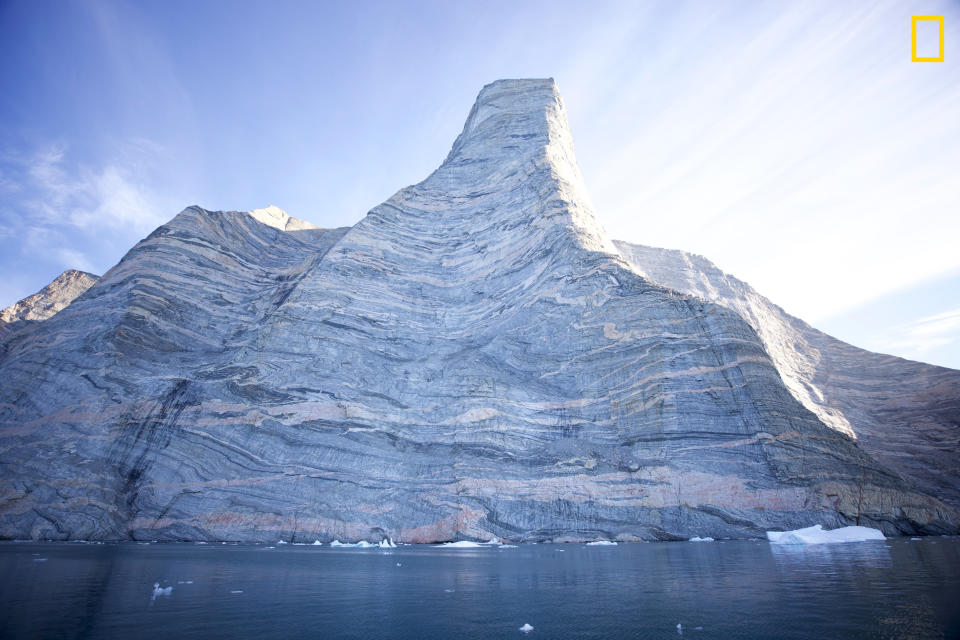 On August 16, 2022 Alex Honnold and Hazel Findlay summited Ingmikortilaq  which in Greenlandic means "the separate one." The formation is named after the peninsula on which it is located. The buttress rises out of the icy waters of Nordvestfjord in the island's Scoresby sound region of Greenland. Honnold commented on the climbing conditions. Credit: Photograph by James Smith, National Geographic for Disney+