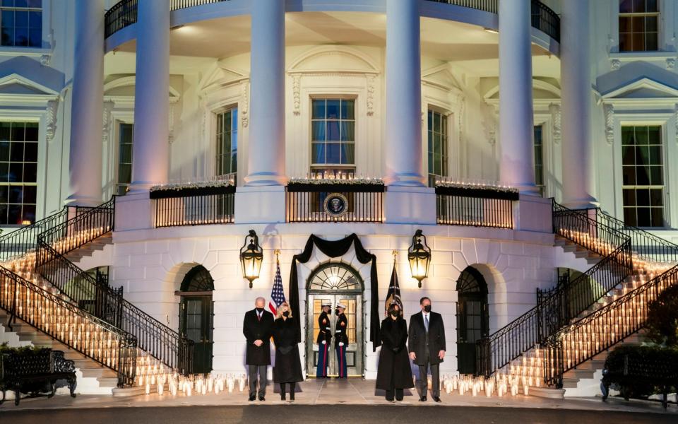 The US president and vice-president and their partners during the ceremony at the White House - EPA