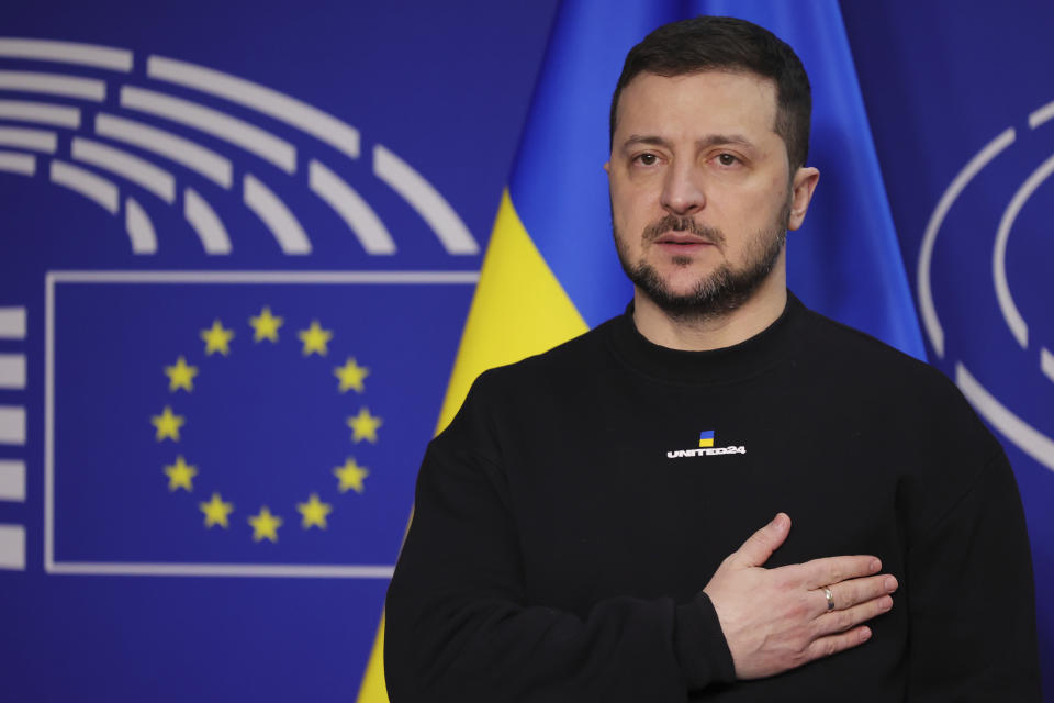 Ukraine's President Volodymyr Zelenskyy poses for a picture before an EU summit at the European Parliament in Brussels, Belgium, Thursday, Feb. 9, 2023. On Thursday, Zelenskyy will join EU leaders at a summit in Brussels, which German Chancellor Olaf Scholz described as a "signal of European solidarity and community." (AP Photo/Olivier Matthys)