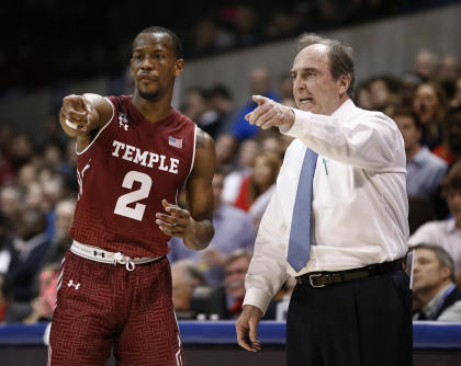 Temple coach Fran Dunphy (right) and Will Cummings aim to keep the Owls' NCAA hopes alive. (AP)