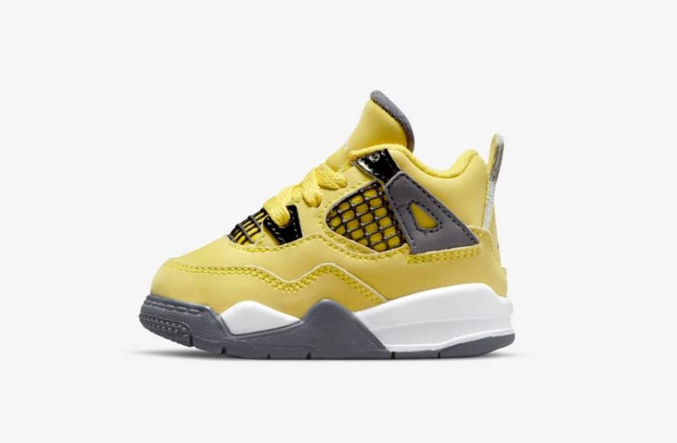 The toddlers’ version of the Air Jordan 4 “Tour Yellow.” - Credit: Courtesy of Nike