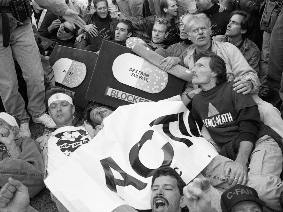 AIDS activist group ACT UP (AIDS Coalition to Unleash Power) protest at the headquarters of the Food and Drug Administration (FDA) on October 11, 1988 in Rockville, Maryland. The action, called SEIZE CONTROL OF THE FDA by the group, shut down the FDA for the day.