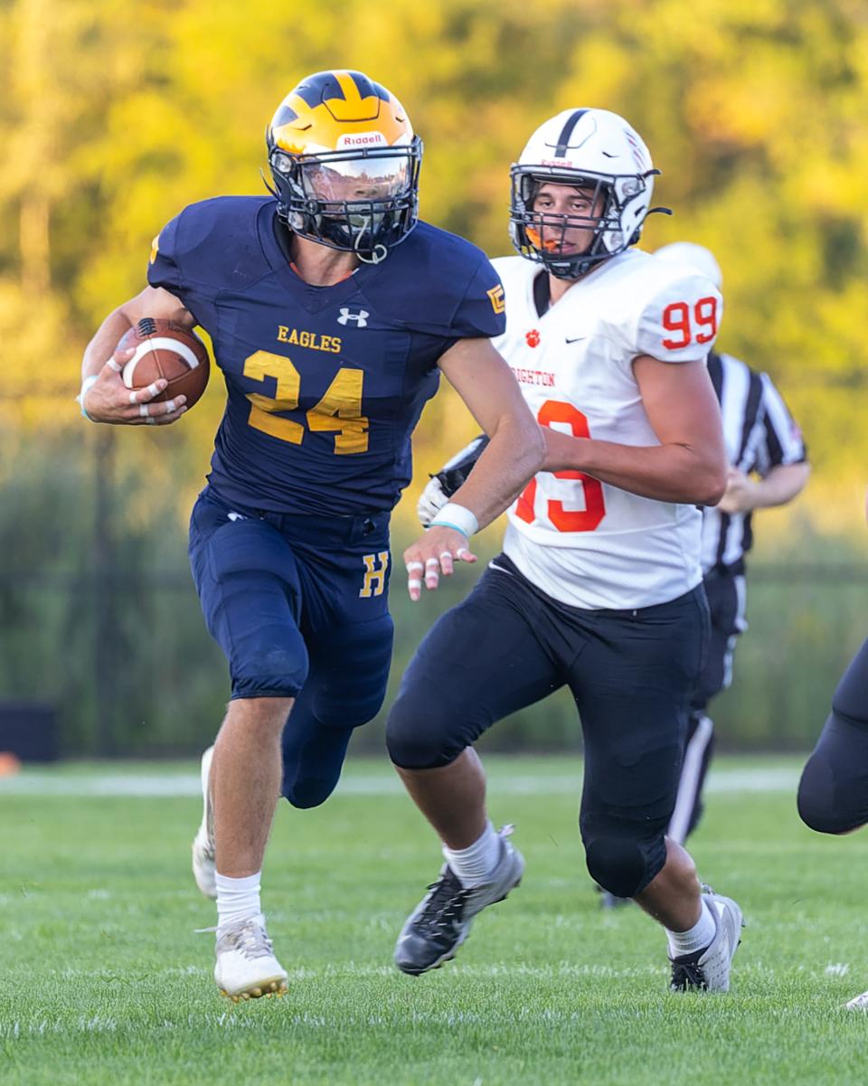 Running back Joey Mattord (24) and his Hartland teammates will host Plymouth Friday.