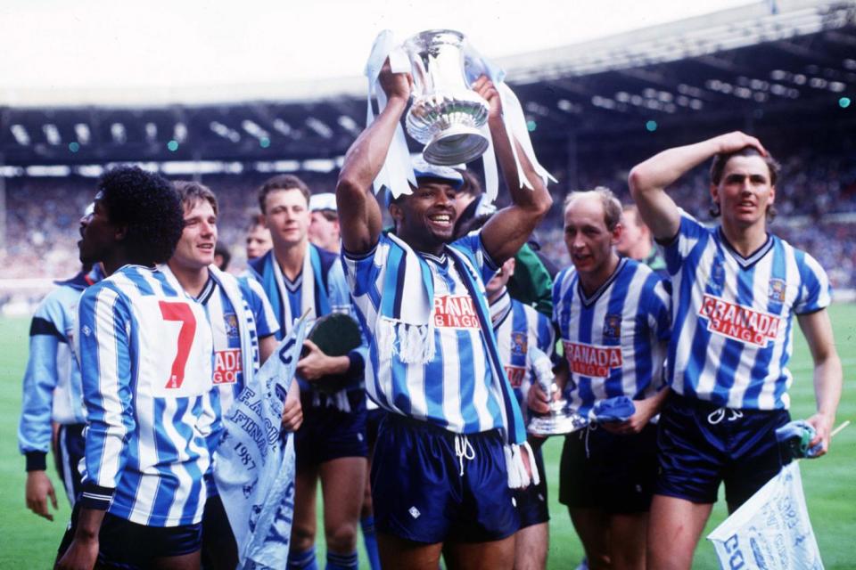 Cyrille Regis enjoys the moment after winning the FA Cup with Coventry Photo: Rex