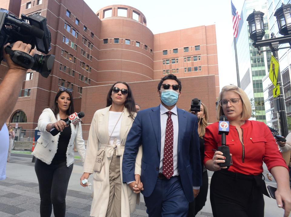 Former Fall River Mayor Jasiel Correia II,  exits John Joseph Moakley Federal Courthouse with his wife Jen Fernandes on Tuesday, Sept. 21, 2021. 