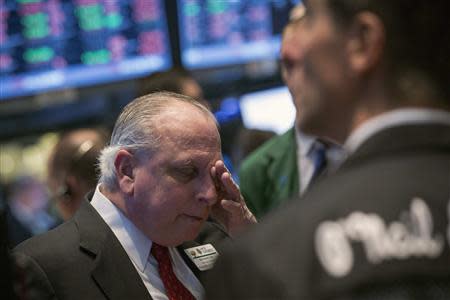 Traders work on the floor of the New York Stock Exchange March 3, 2014. REUTERS/Brendan McDermid