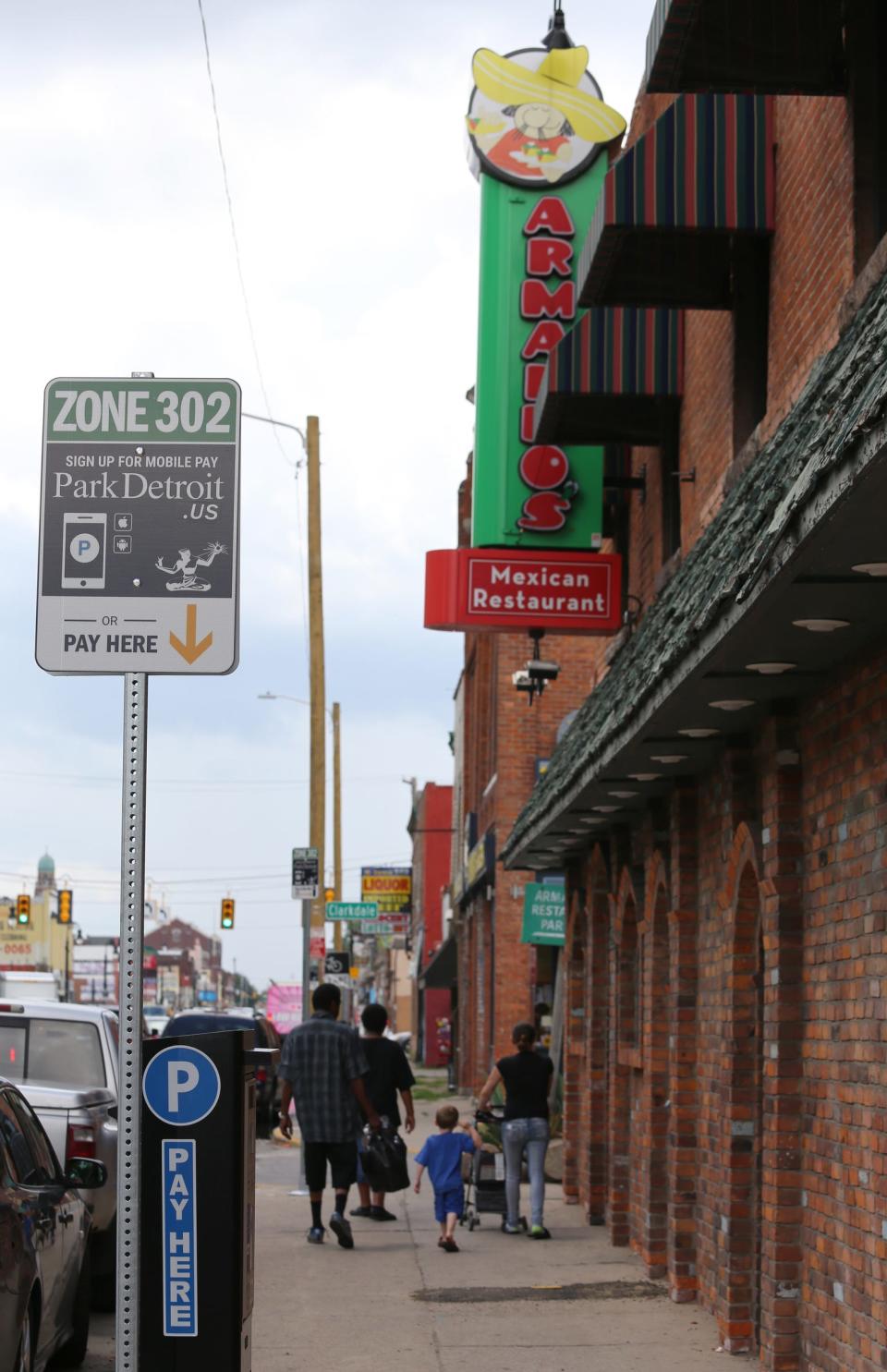 Parking meters were installed in 2015 in some Detroit neighborhoods where parking was once free. This meter is Mexicantown in Southwest Detroit.