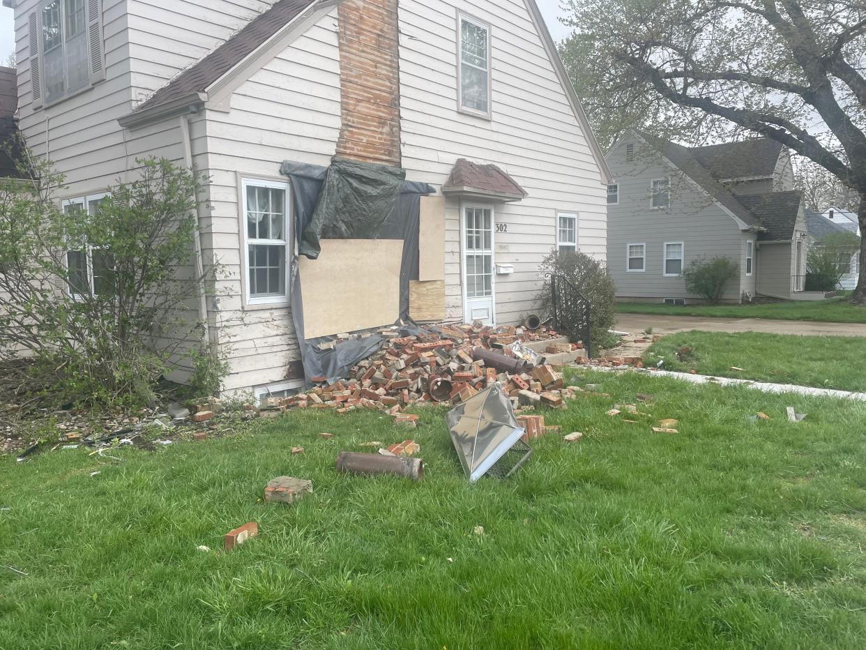 Damage can be seen Monday, April 29, 2024, at a home near the intersection of E.18th Street and S. 2nd Avenue, where a deadly crash killed two juveniles and injured five more Saturday, April 27, 2024.