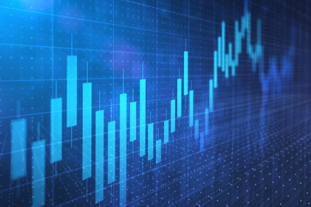 Close up of stock market chart and worried atmosphere on a dark background.