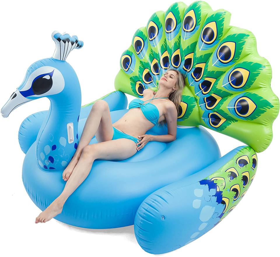 <p>Make a flamboyant splash at the pool this summer when you debut <a href="https://www.amazon.com/JOYIN-Inflatable-Peacock-Floaties-Island/dp/B07D1BXF7K?tag=skyahoo-20" rel="nofollow noopener" target="_blank" data-ylk="slk:this colorful peacock floatie;elm:context_link;itc:0" class="link ">this colorful peacock floatie</a>.</p> <a href="https://www.amazon.com/dp/B07D1BXF7K?tag=skyahoo-20&linkCode=ogi&th=1&psc=1&language=en_US&asc_source=web&asc_campaign=web&asc_refurl=https%3A%2F%2Fwww.sheknows.com%2Fliving%2Fslideshow%2F9601%2Fbest-pool-floats%2F" rel="nofollow noopener" target="_blank" data-ylk="slk:Buy: JOYIN Inflatable Peacock Pool Float $39, Originally $60;elm:context_link;itc:0" class="link ">Buy: JOYIN Inflatable Peacock Pool Float $39, Originally $60</a>