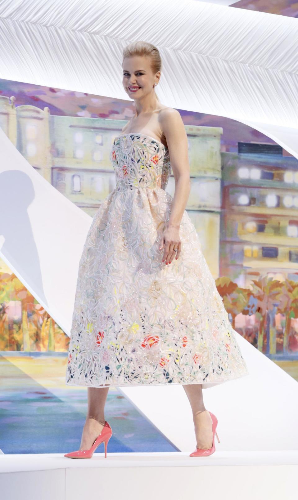 FILE - This May 15, 2013 file photo shows actor and jury member Nicole Kidman wearing a white-ground floral dress by Christian Dior Couture during the opening ceremony for the 66th international film festival, in Cannes, southern France. (Photo by Todd Williamson/Invision/AP, file)