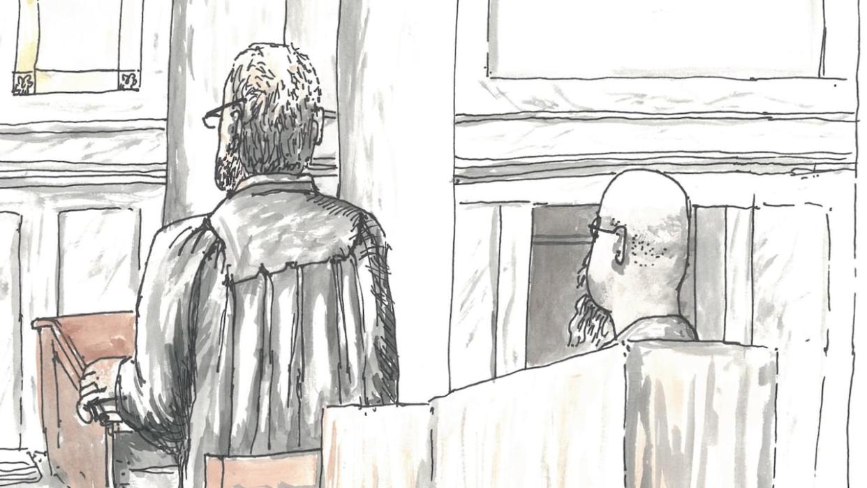 A courtroom sketch shows Jeremy Skibicki sitting silently in the accused box near his lawyers on Monday, during the first day of his trial in the deaths of four women in Winnipeg. His trial continued Tuesday. (James Culleton - image credit)