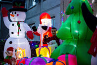 A mum has gone all out to cheer up her kids and neighbours by putting up her CHRISTMAS decorations three months early - including 3,000 outdoor lights. Caroline Gabe, 46, has been shielding with her children since March - and said putting up her tree and decorations in September was a much-needed boost. She has spent the year buying outdoor lights and installations - from as far away as America - and put them all up last week, on a whim. Almost all of them are outside - including 3,000 fairy lights, sparkling snow, an 8ft inflatable snowman, as well as Santa and his reindeer.