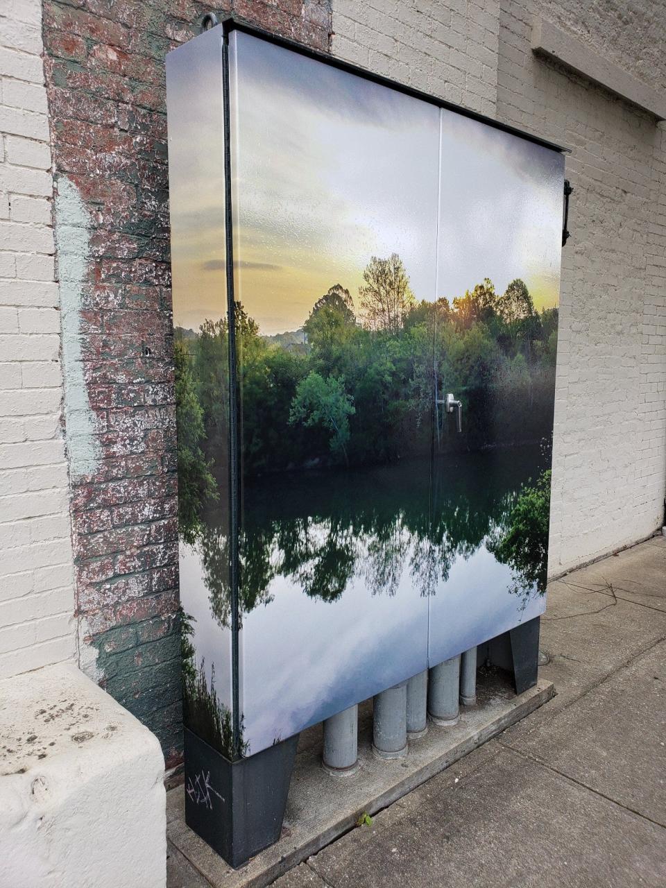 A photo of The Duck River by Ross Jaynes adorns one of several utility boxes as part of a new public art project spearheaded by The Columbia Arts Council.
