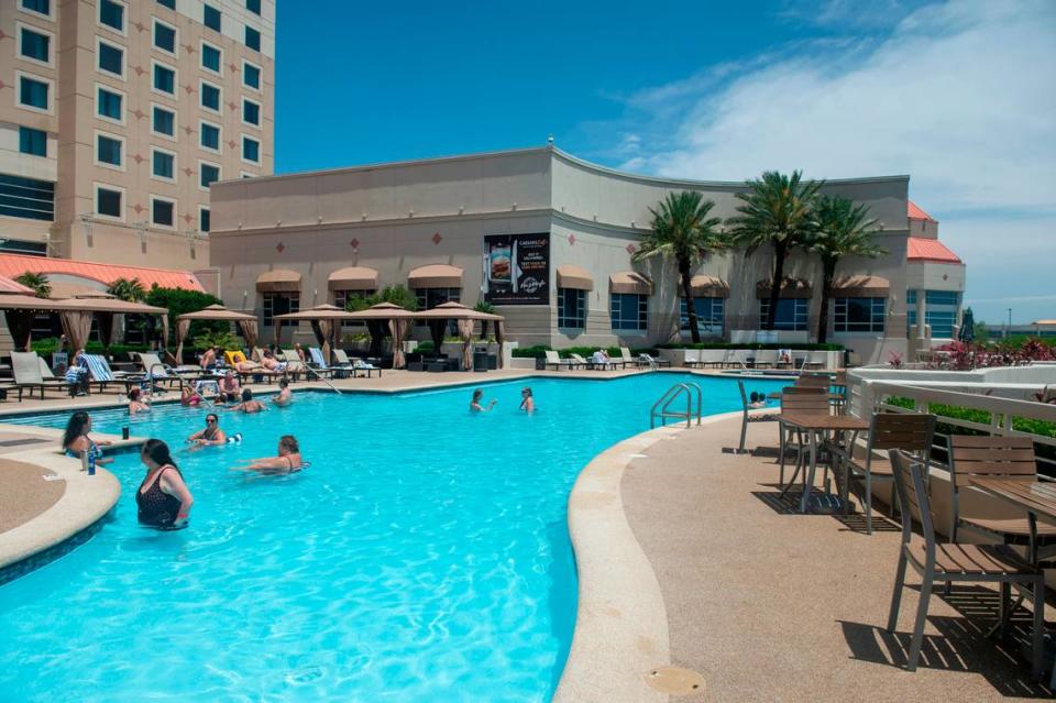 The pool at Harrah’s Gulf Coast casino in Biloxi is a favorite place to cool off with a swim and a frozen daiquiri.