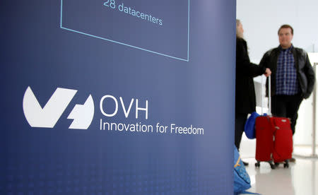 Visitors stand at the French web-hosting and server provider OVH Group new headquarters in Paris, France, October 17, 2018. Picture taken October 17, 2018. REUTERS/Charles Platiau