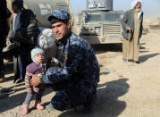 <p>Iraqi security forces transfer displaced Iraqis who fled their homes during fighting between Iraqi special forces and Islamic State militants, on the western side of Mosul, Iraq, Saturday, Feb. 25. 2017. (AP Photo/ Khalid Mohammed) </p>